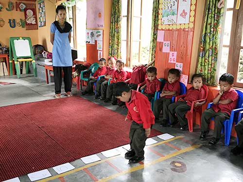 Manta teaching at Samthar School